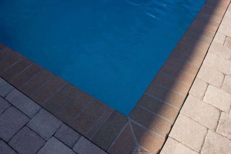 Why Pavers Are the Perfect Choice for Pool Decks and Patios